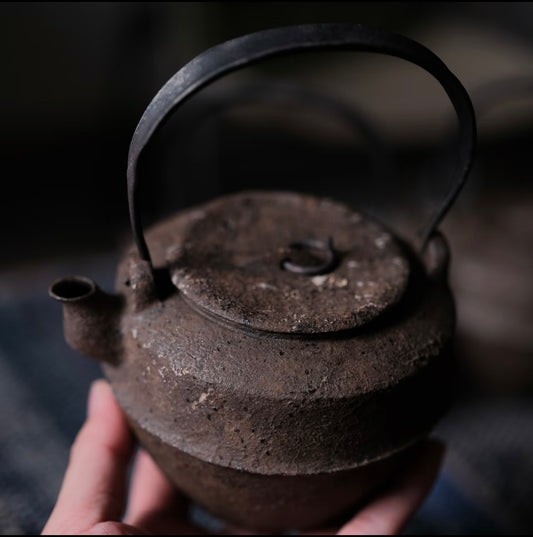 Rusted iron handle pot
